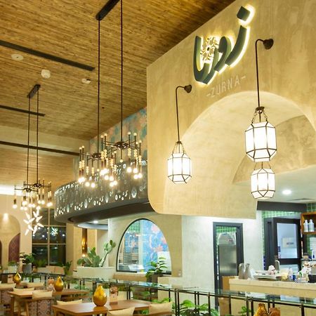 Citadines Abha Aparthotel Kültér fotó Interior of the restaurant